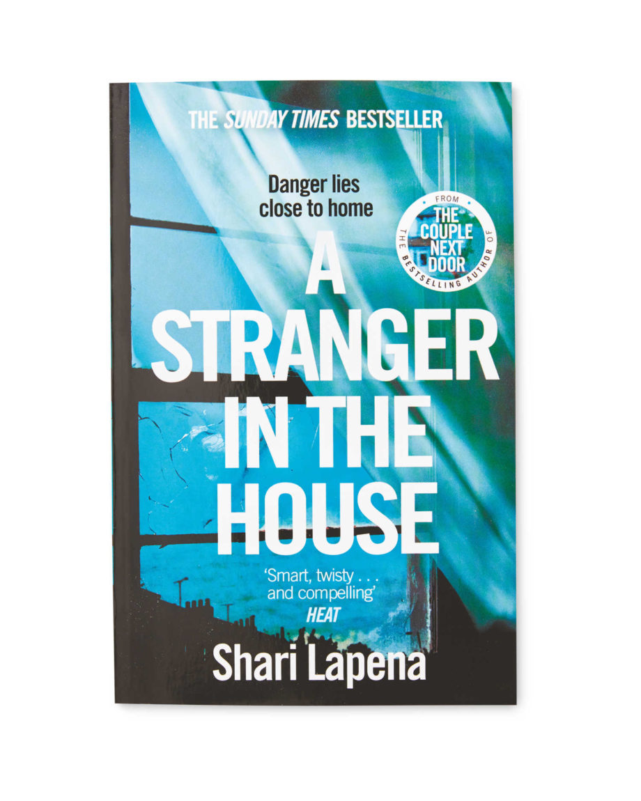 A Stranger in the House paperback novel