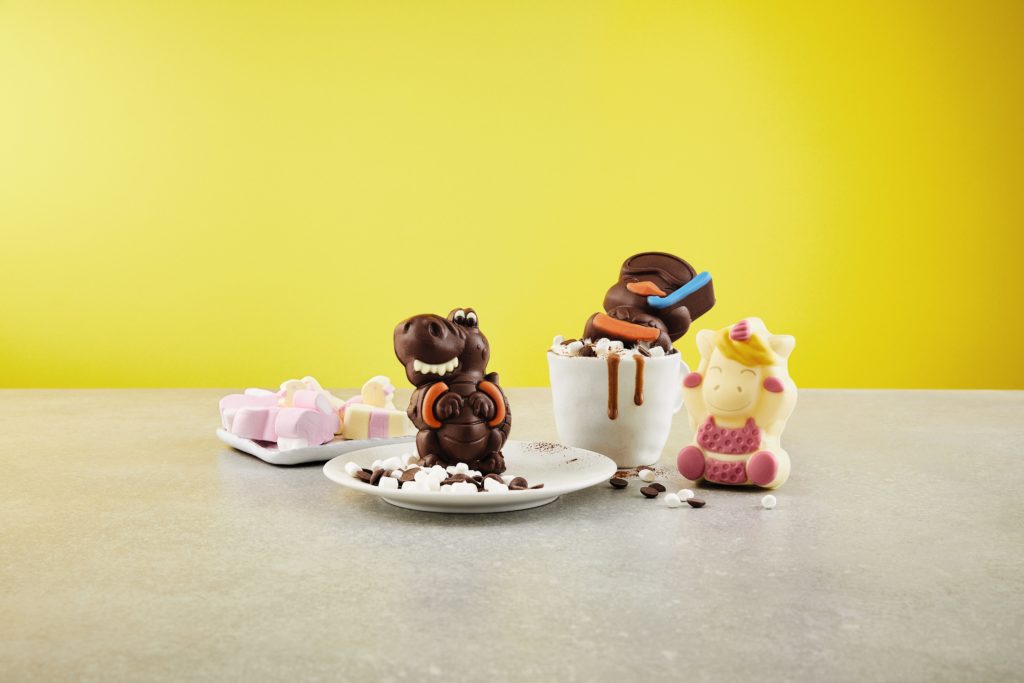 Aldi's Easter Mug Melts including the White Chocolate Unicorn, Milk Chocolate Chick and Milk Chocolate Dinosaur.