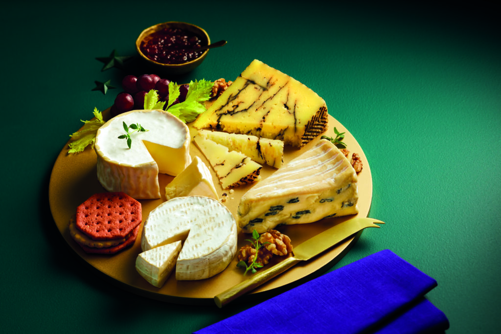Aldi's continental cheese selection including stilton and brie with crackers and nuts