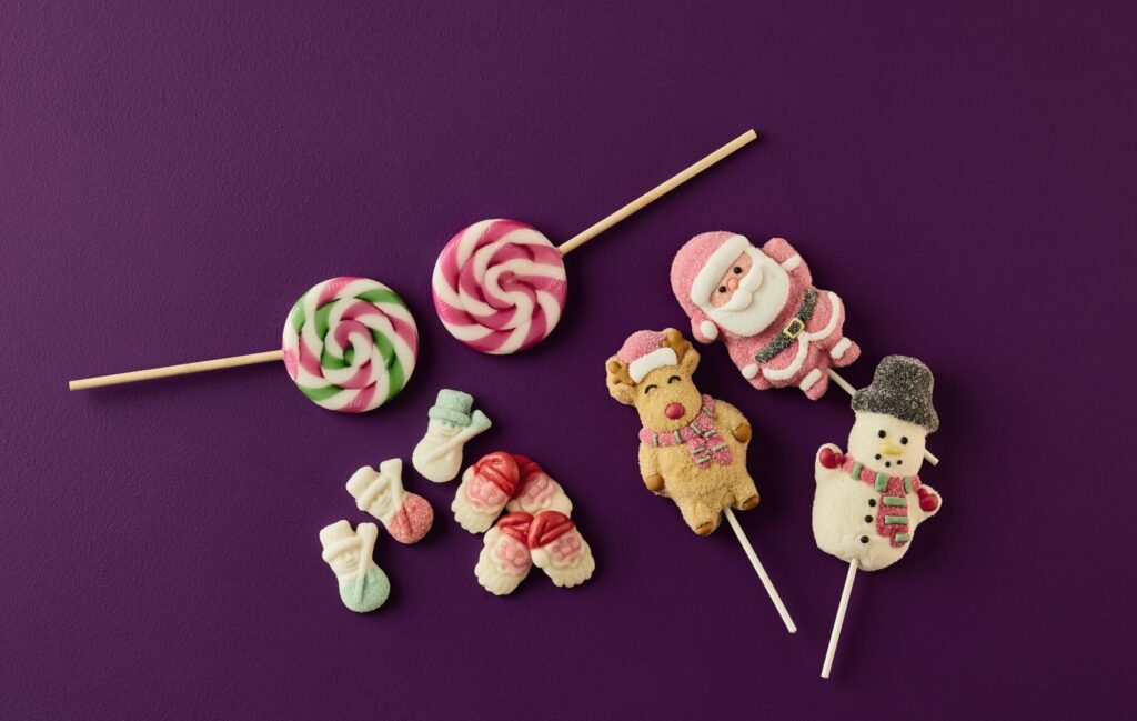 Christmas sweets - candy cane lollies, Christmas character lollies in shape of Santa, Reindeer and Snowman.