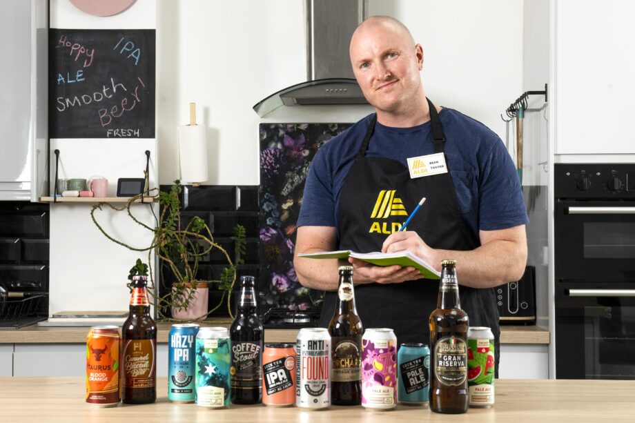 Aldi's beer taster competition winner making notes on his favourite beers